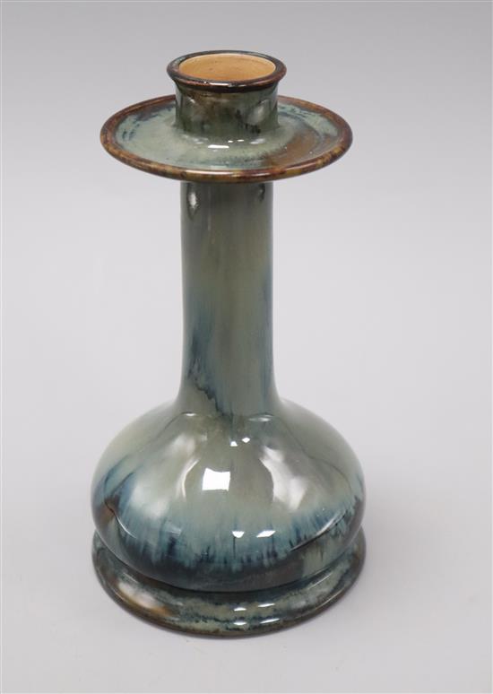 A Doulton candlestick of plain onion form